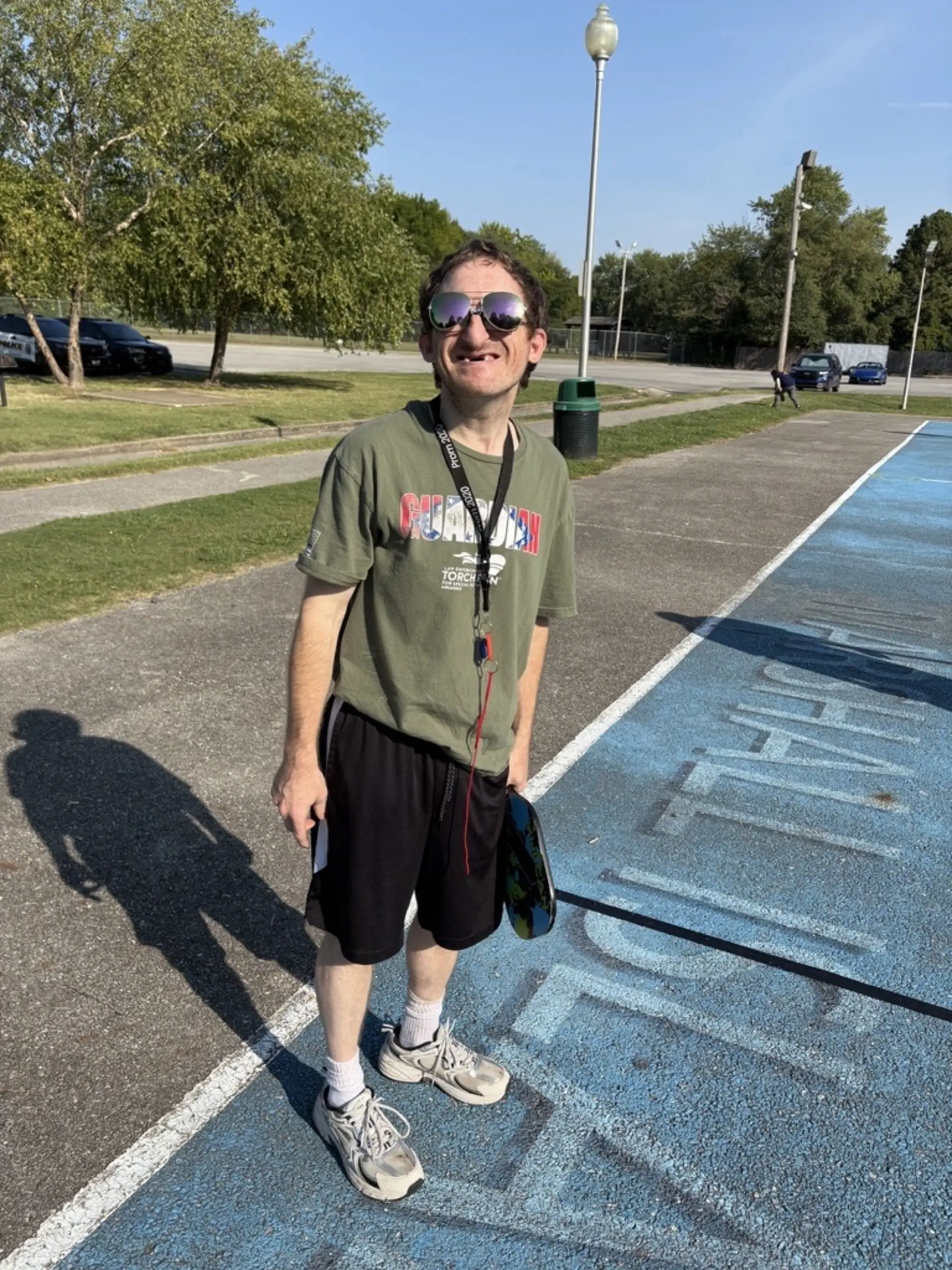 An ERC client playing pickleball