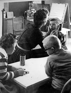 Elizabeth Richardson with children being served by the ERC